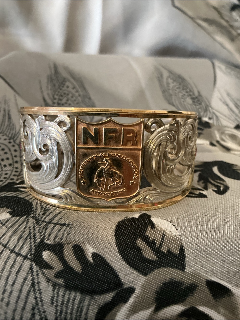 Montana Silversmiths Two-Tone NFR Western Scroll Cuff Bracelet with Ruby Accents - Picture 2 of 8